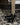 Nordal - NOLI rullebord i jern med træhylder – sort – L59,5 × B38,5 × H83 cm